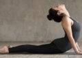 yoga-poses-reduce-back-pain-theyogazine
